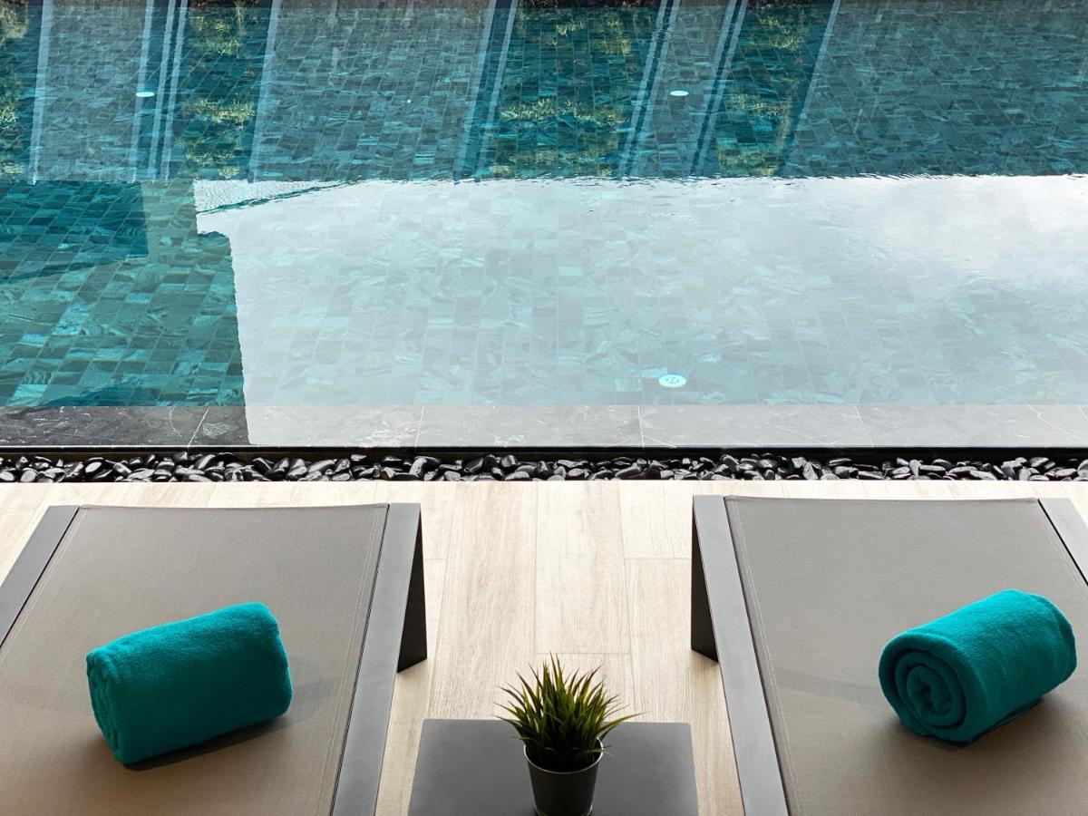 The Oceanic Sportel Phuket - Sha Extra Plus 外观 照片 The swimming pool at the hotel